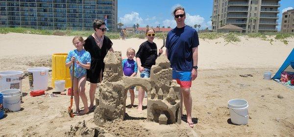 Families rock sandcastles