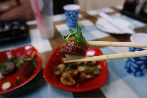 A true Taiwanese combination, garlic, Taiwanese sausage, Peanut glutinous rice sausage, and cilantro.