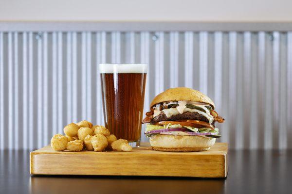 Our signature cheese curds, burger, and ice cold beer.