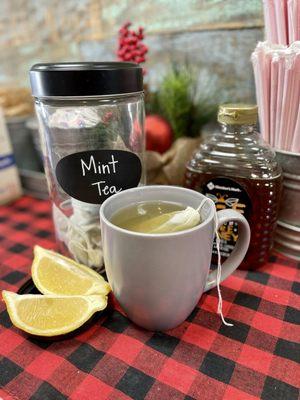 Sick Tea - hot mint and green teas with steamed lemonade and honey. Add peach for a little something special