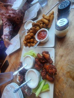 their appetizer sampler and chicken wings!! yummy