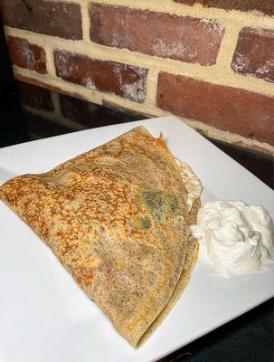 Springwood Breakfast Crepe: egg, cheddar, bacon, roasted red peppers, spinach, spring onion, and sour cream