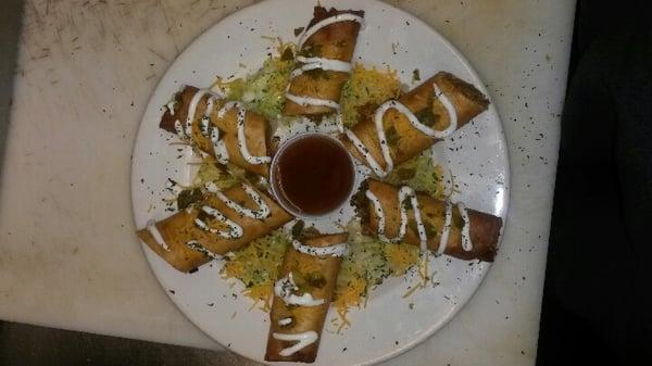 Hand rolled chicken flautas with jalapeno jelly