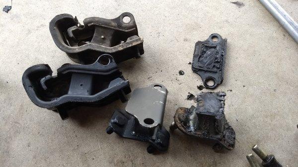 stress on the engine mount result of improper installation. Photo shows old and new