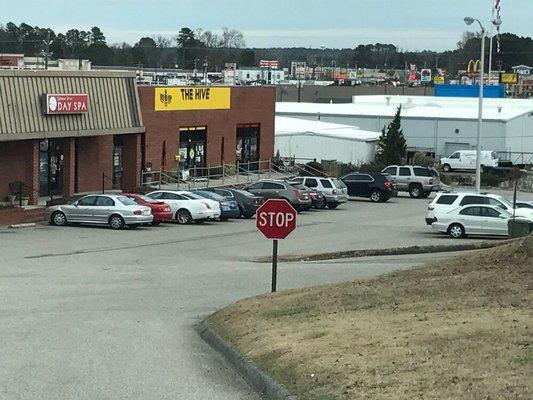 As seen from S. Long Drive, off East Broad Ave (US 74).  Look for the bright yellow "Hive" sign