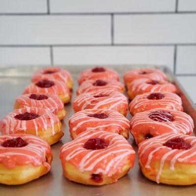 Cherry bits glazed with house made icing and real cherry bits!