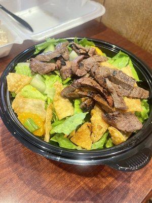 Pake Salad with teri beef steak - super fresh greens. Get it w/the  oriental dressing.