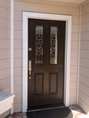 Masonite Fiberglass wood grain, stain finish and decorative glass. Orange, CA