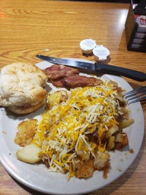 Ordered from the sides menu.. buiscutt, bacon, loaded sliced potatoes.