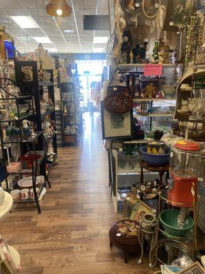 20% off sale on right shelf...glassware, ceramics at left.