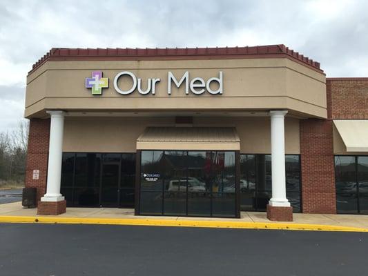 Photo of the front of the OurMed clinic in the Chantilly Corners shopping center.