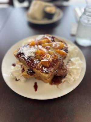 Peach marscapone French toast with raspberry drizzle