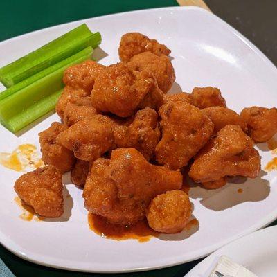 Cauliflower wings rolled with buffalo sauce