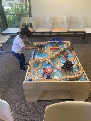 Sebastian loves the waiting room and enjoys the toys