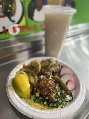 Chorizo Taco, and Pastor Taco, radish, lemon, and a horchata.