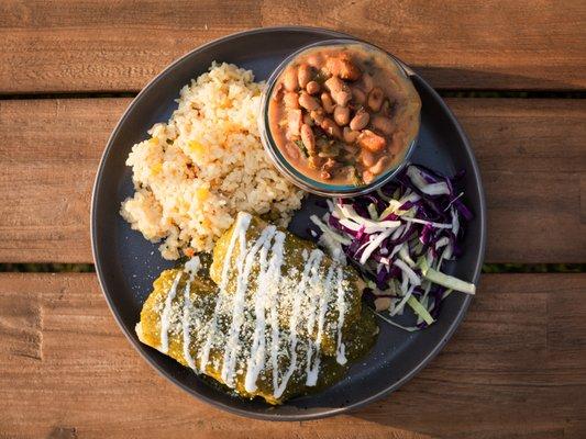 Chicken Tamales - Tomatillo Sauce, Crema, Cotija, Mexican Rice, Charro Beans, and Cabbage Salad