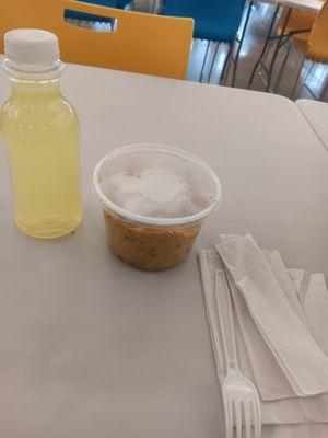 A loaded rotel potato bowl with a lemonade