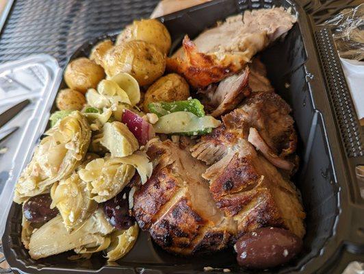 Pork loin, artichoke salad, and parmesan potatoes