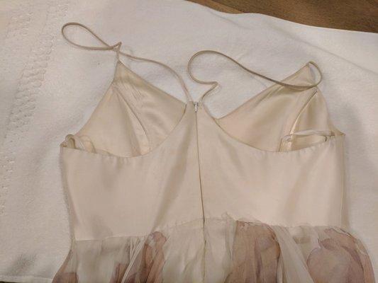 Straps and bodice were stained