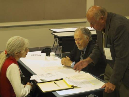 Rosario Sapienza and Wint Mather advising a client