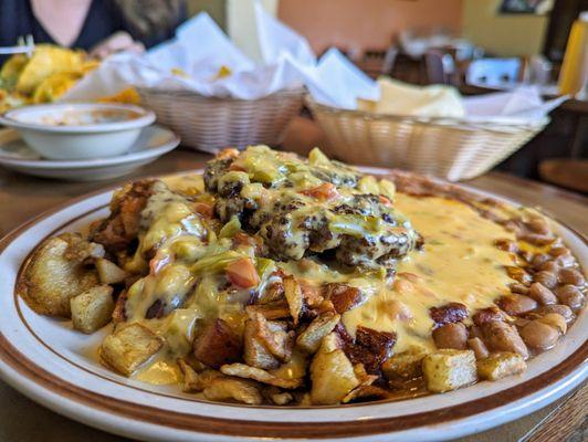 Roberto's Special, Christmas (again). Half-pound char-grilled beef patty, chile con queso, chiles, papas y beans