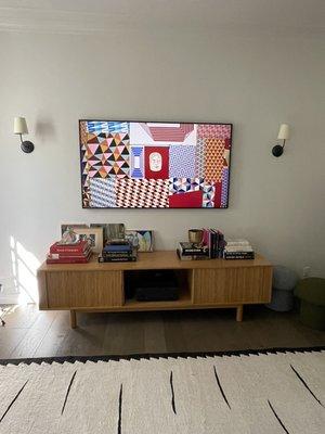 75" frame TV with surround sound and wires hidden