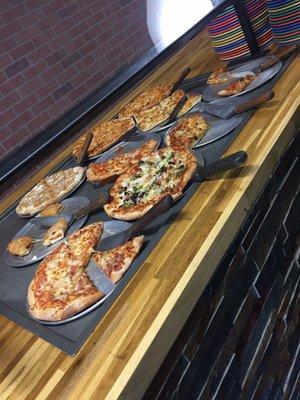 Pizza selection for the buffet at 1pm on a weekday. The pizza is pretty good.