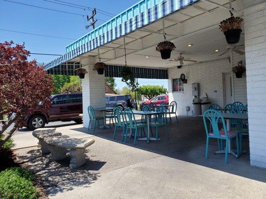 Plenty of outdoor shaded seating in front and in back