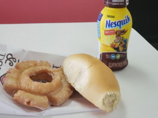 Old fashioned,  chocolate milk,  and a sausage and cheese kolache.