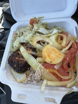 Jerk Salmon with rice and peas and cabbage.