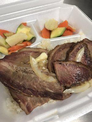 Braised Beef Brisket over rice w/ summer vegetables.