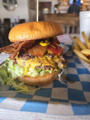 Classic double bacon smash cheeseburger and fries.