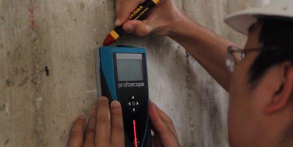 marking the rebar in a column on a Non-Ductile Concrete building.