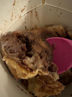 Chocolate croissant bread pudding in to-go container (2 scoops for $10)