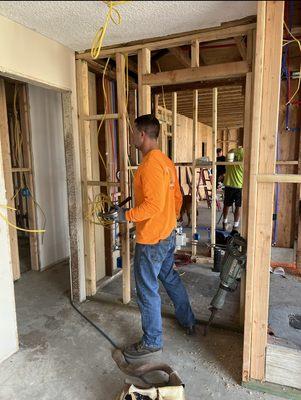 Brett working on the home through renovation