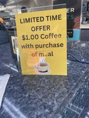 Sign that offers the $1 coffee