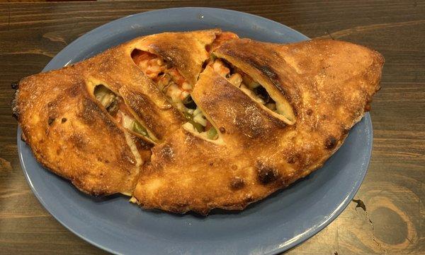 Stuffed pizza (a calzone). So good! Also enormous!