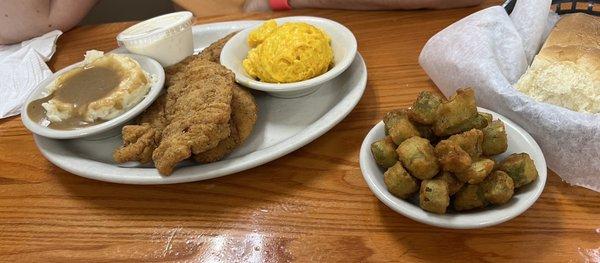 Chicken tenders , mashed potatoes, Mac and cheese, okra and bread rolls