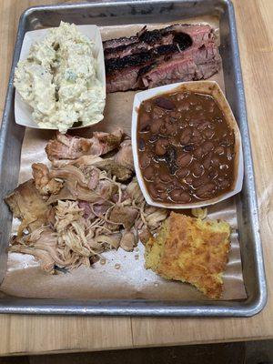 2 meat platter $16 Brisket and pulled chicken Beans, Potato Salad, Cornbread