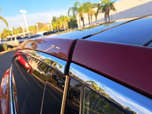 Top view of right rear door closed tight on 2016 Tesla X