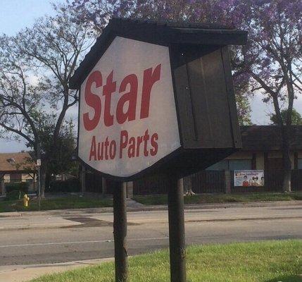 Star Auto Parts' sign, facing traffic on busy Riverside Drive in Chino.