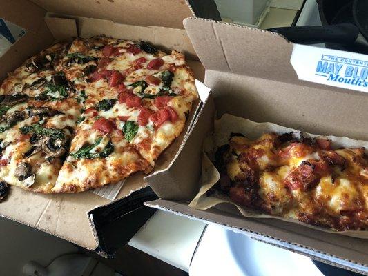 Medium Handmade pan pizza with spinach and half mushroom, half tomatoes along side the chicken with bacon and tomatoes.