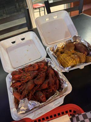 Crawfish with Cajun seasoning, order of potatoes, corn and sausage.