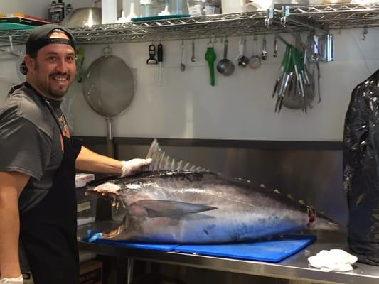 Chef cutting up our poke tuna.