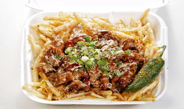 New menu is here!  Chicken Teriyaki Fries. This includes fries, cheese, house dressing, teriyaki chicken or beef, onion and sesame on top.