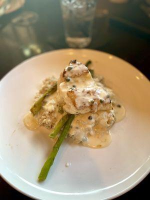 Chilean Sea Bass: sautéed, served over mushroom risotto, fresh grilled asparagus, limoncello sauce