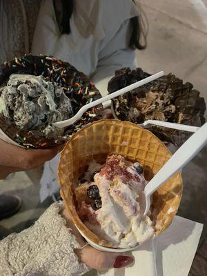 Mint chocolate chip on a chocolate bowl with sprinkles, cheesecake with berries and chocolate on chocolate icecream. Delicious