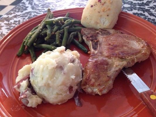 The lunch special for Oct. 21, 2015. Center cut pork chop with mashed potatoes and green beans.