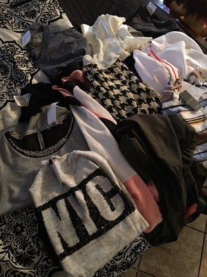 About 11 clothing pieces for $30... everything half of this weekend!