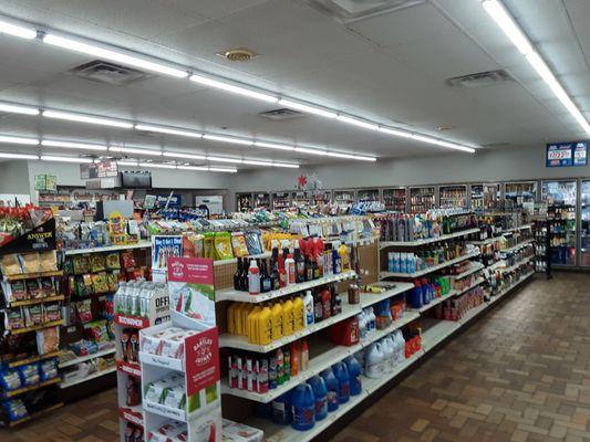 Inside the QD. Packed with convenience items, a bottle return, a movie box, and not-so-fresh produce.